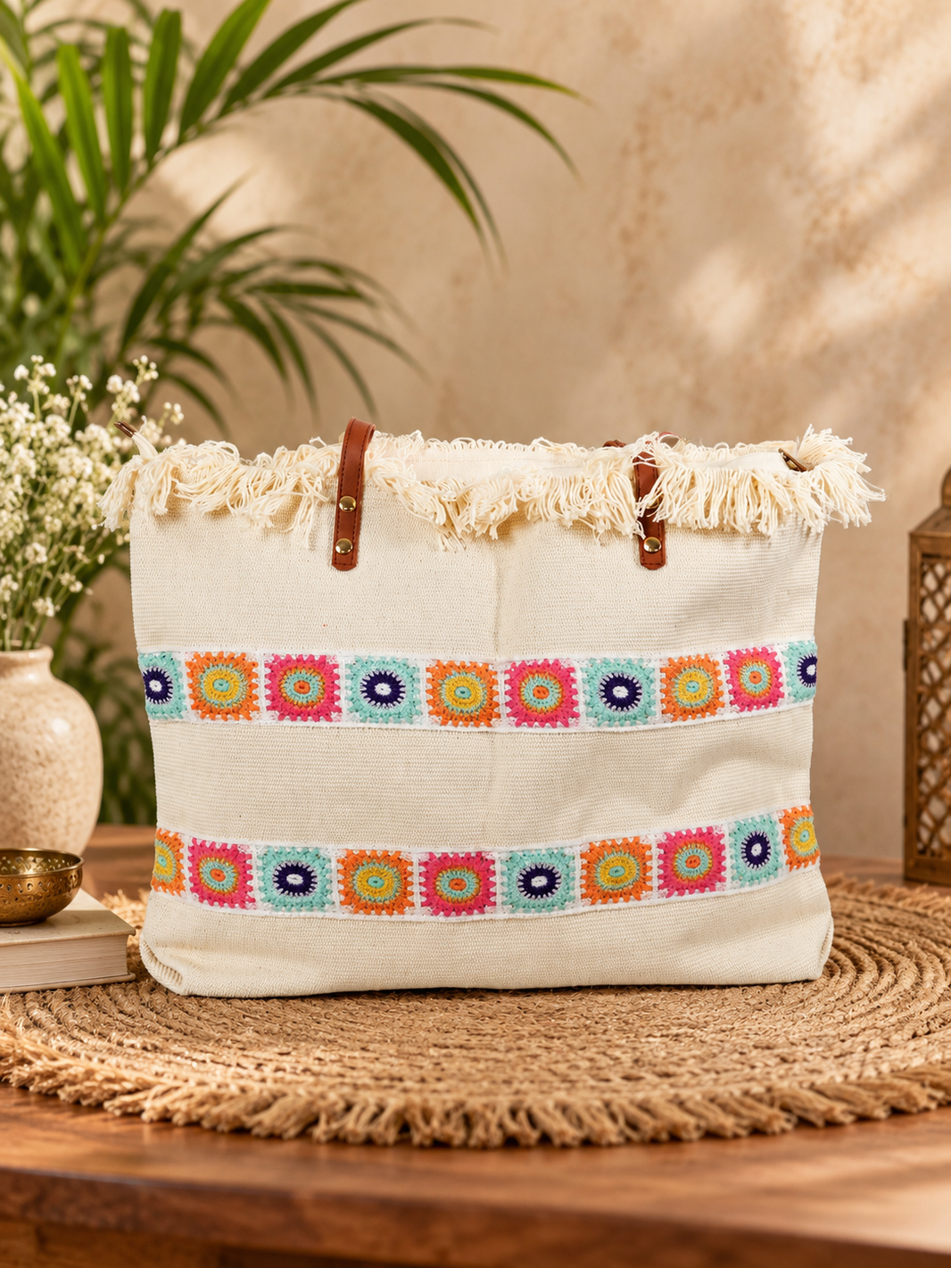 The Aabha - cream-coloured handcrafted tote bag with colourful crochet detailing