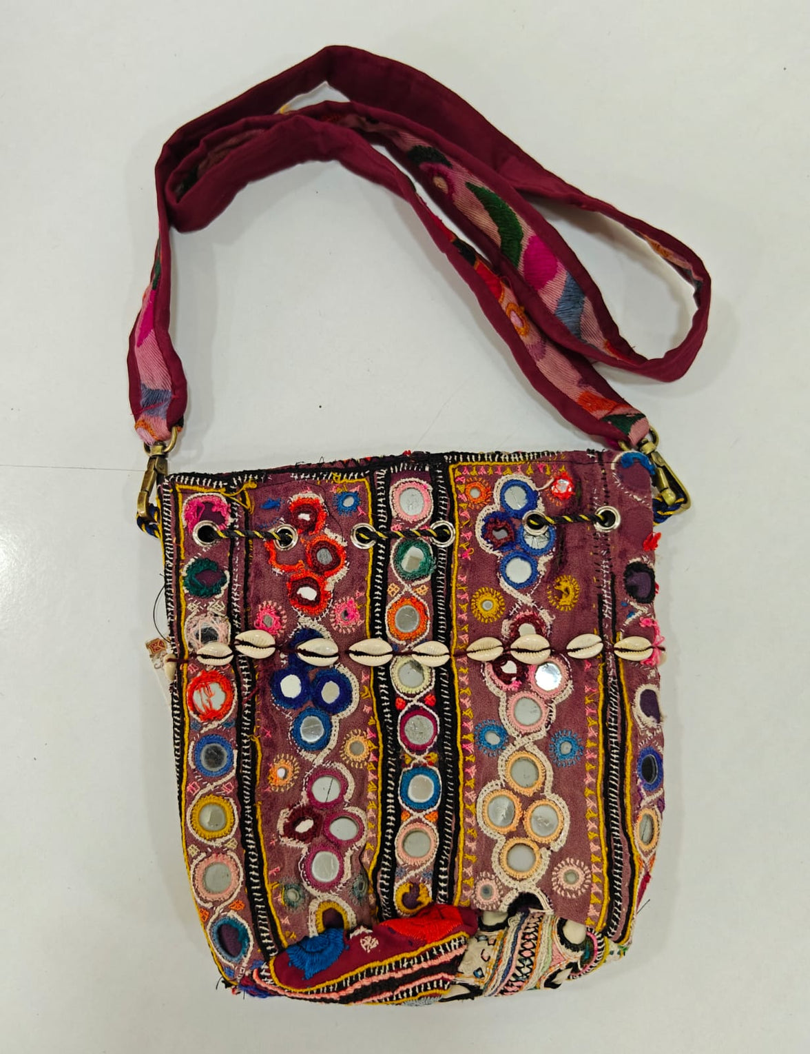 Handcrafted Kutchi Mirror Work Sling Bag with Cowrie Shell Accents