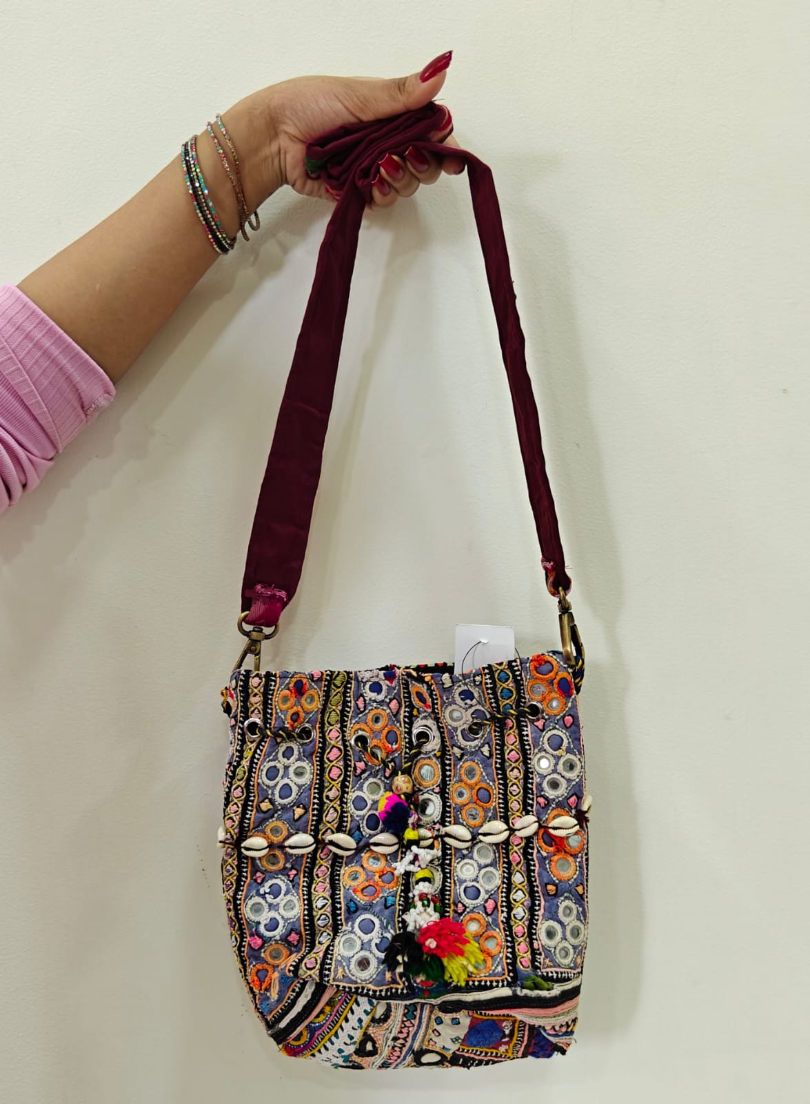 Handcrafted Kutchi Mirror Work Sling Bag with Cowrie Shell Accents