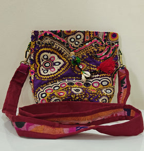 Handcrafted Kutchi Mirror Work Sling Bag with Cowrie Shell Accents