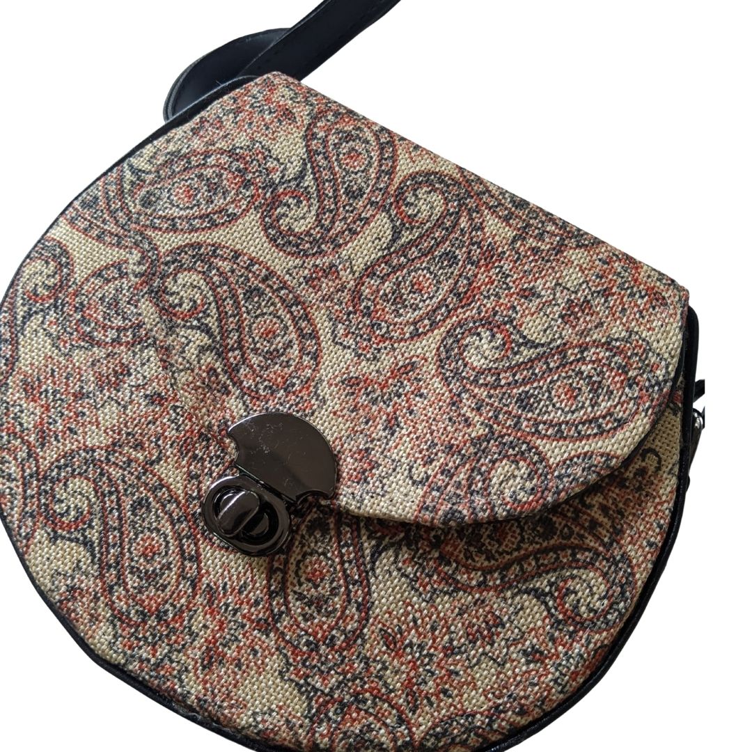 Earthbound Elegance: The Desert Bloom Sling - Heritage Haat