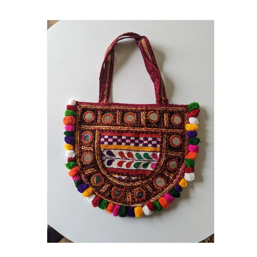 Handcrafted Kutchi Embroidered D-Shape Sling Bag with Mirror Work & Pom-Poms