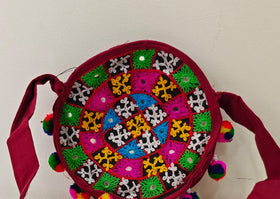 Handcrafted Kutchi Round Embroidered Sling Bag with Mirror Work & Pom-Poms