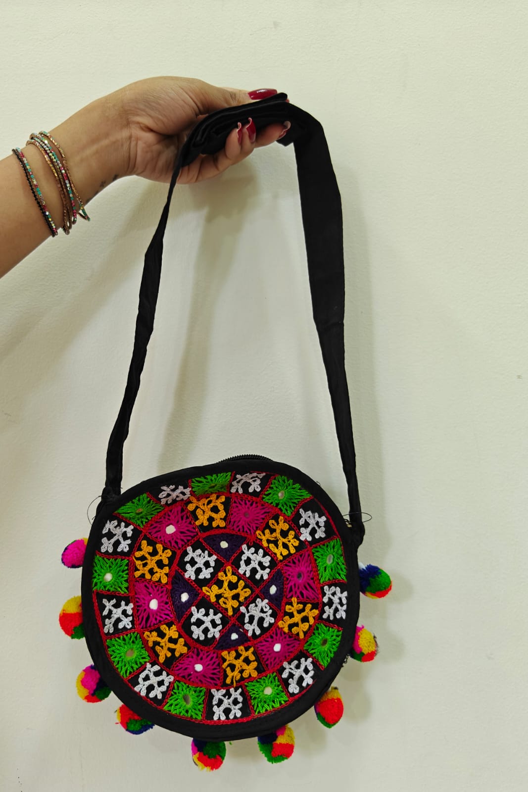 Handcrafted Kutchi Round Embroidered Sling Bag with Mirror Work & Pom-Poms