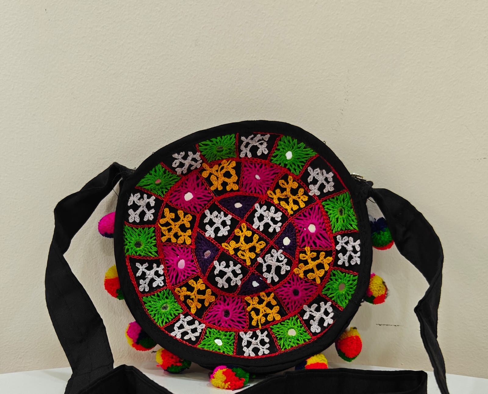 Handcrafted Kutchi Round Embroidered Sling Bag with Mirror Work & Pom-Poms