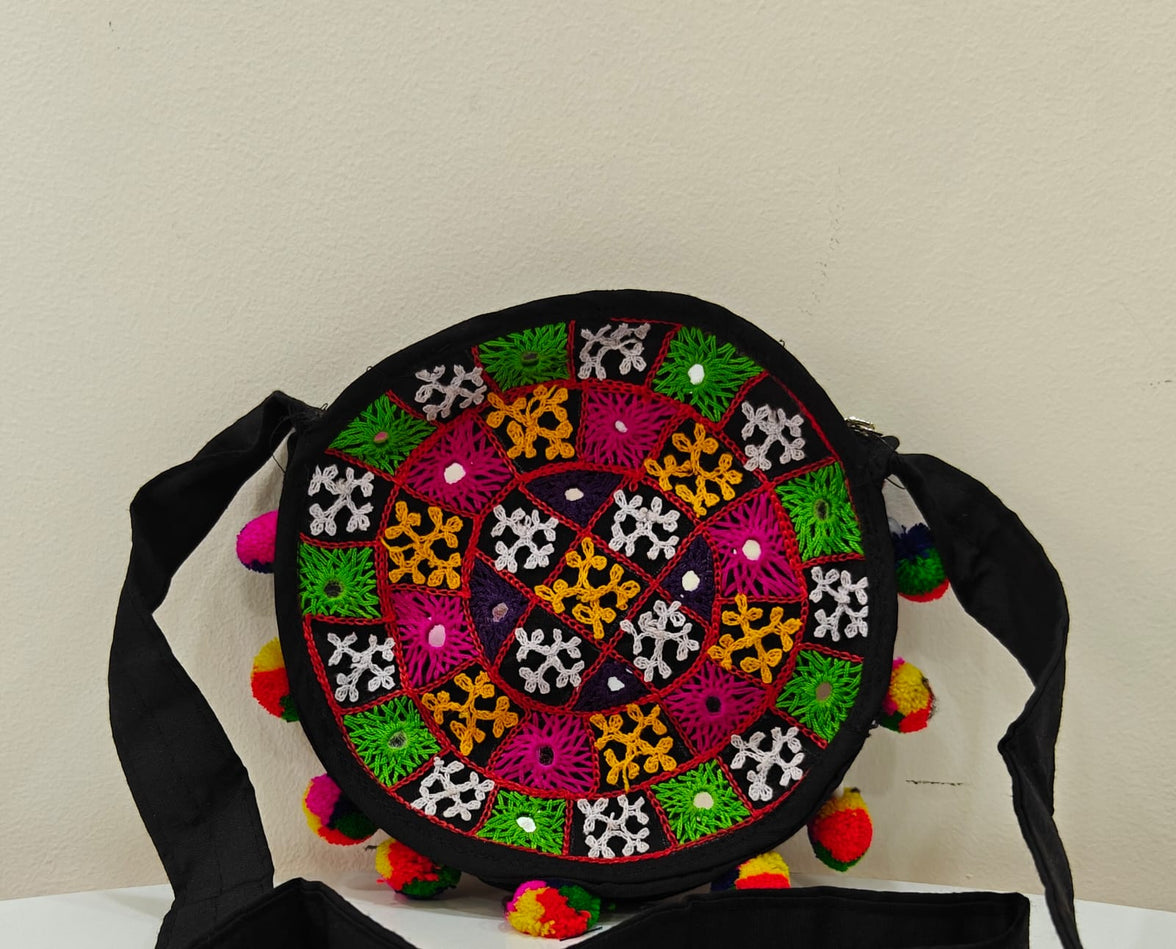 Handcrafted Kutchi Round Embroidered Sling Bag with Mirror Work & Pom-Poms